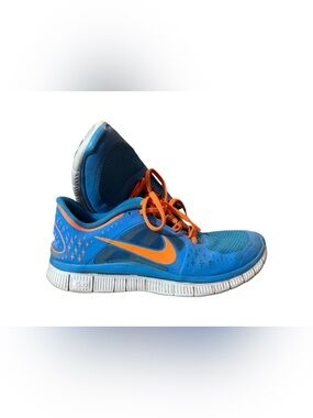 Nike Blue Sneakers with Orange Swoosh
